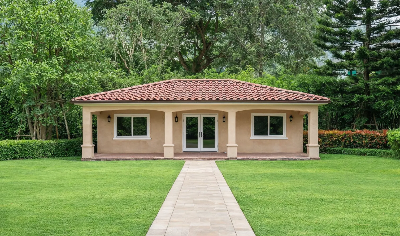 Detached ADU construction in Los Angeles featuring modern backyard unit with patio and landscaped surroundings
