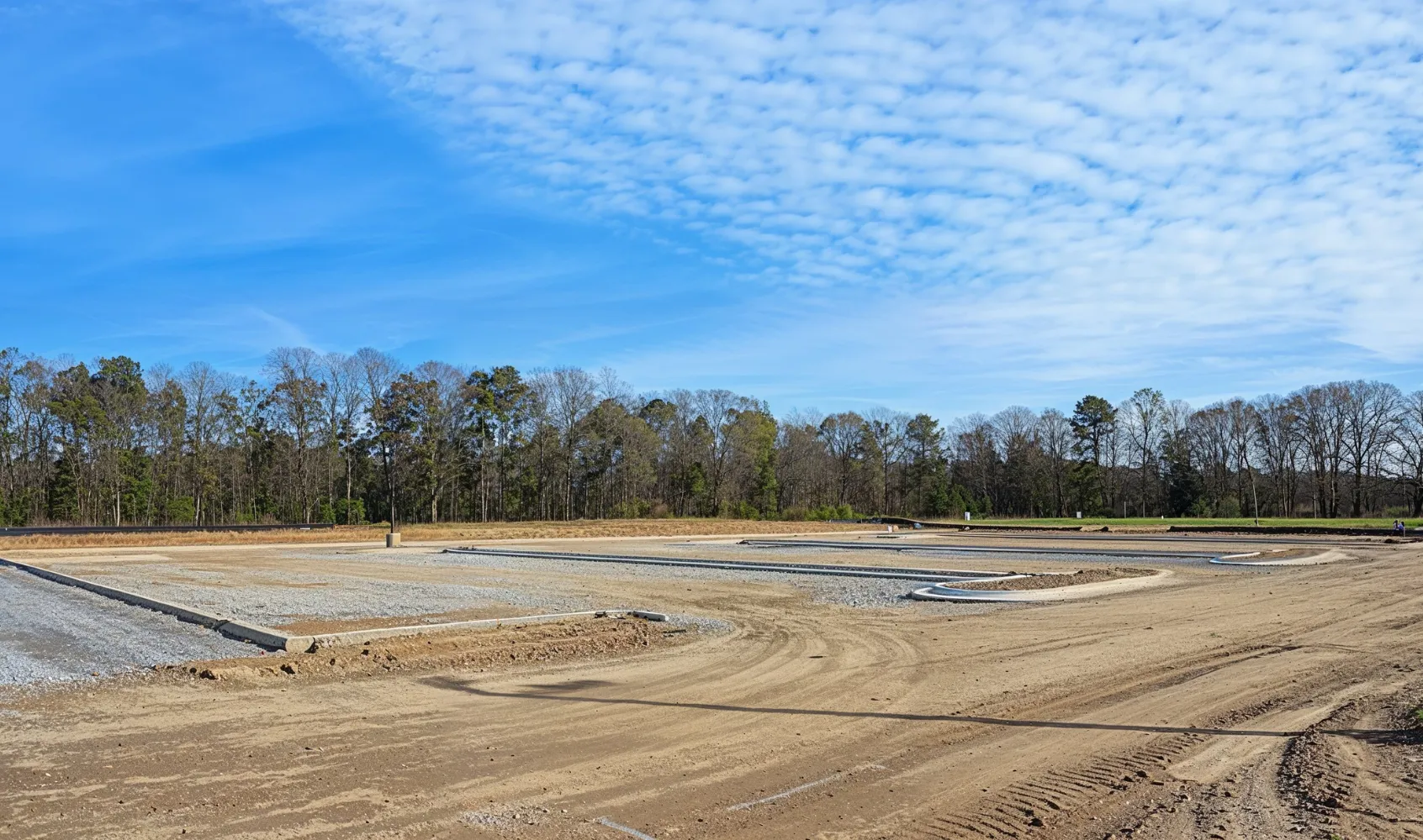 Empty commercial construction site in Los Angeles prepared for development with cleared land and grading work completed