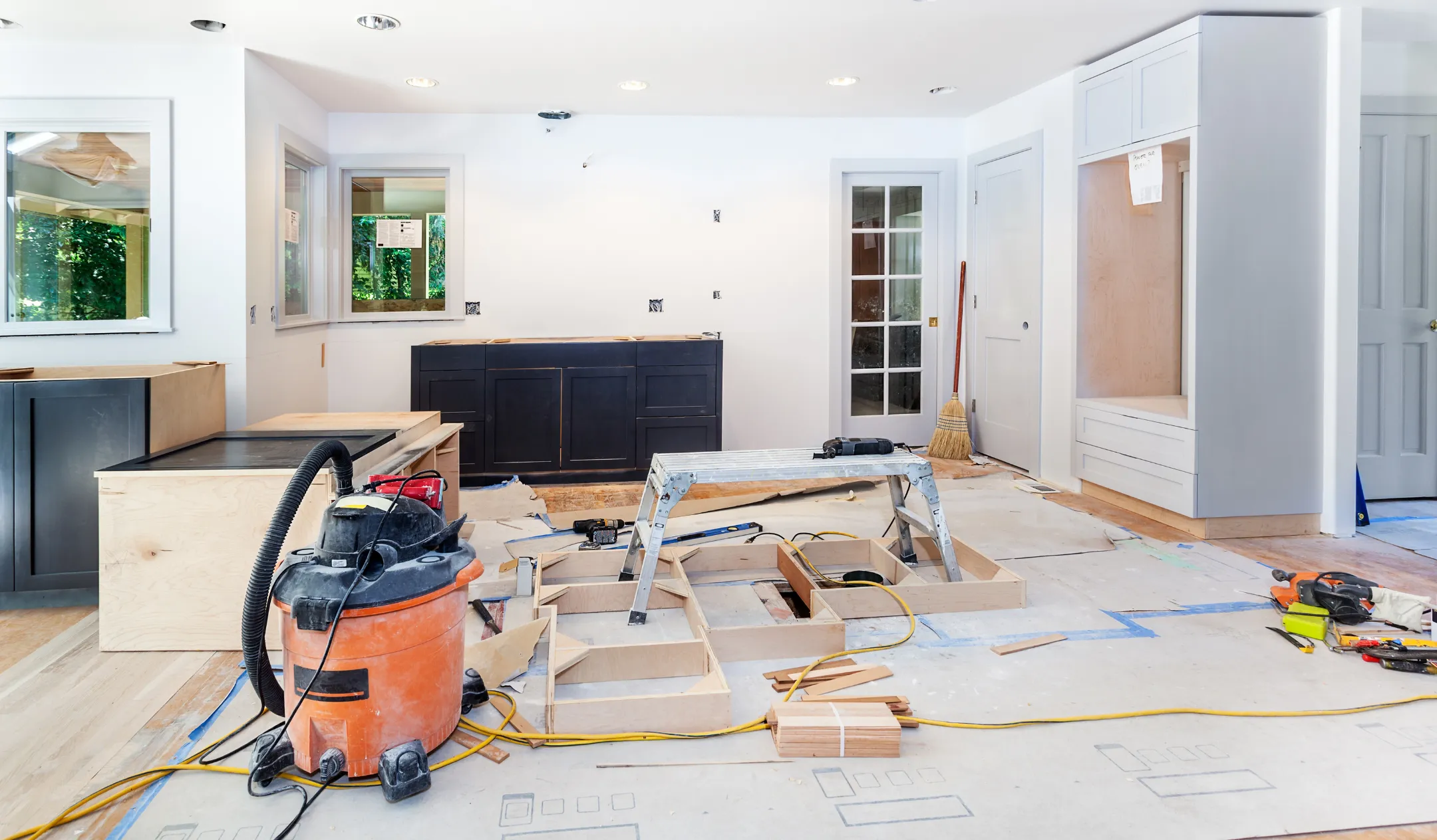 Kitchen remodeling in Los Angeles featuring modern cabinet installation and ongoing renovation work inside residential kitchen space