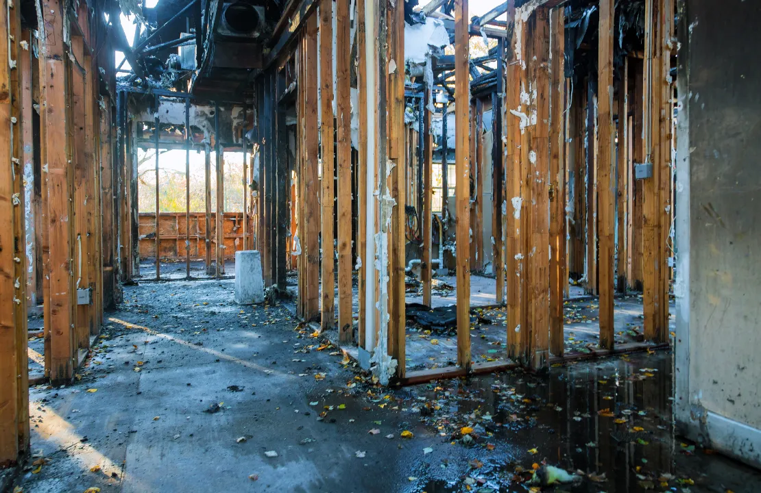 Fire damage interior in Los Angeles showing burned house with structural damage before rebuild process