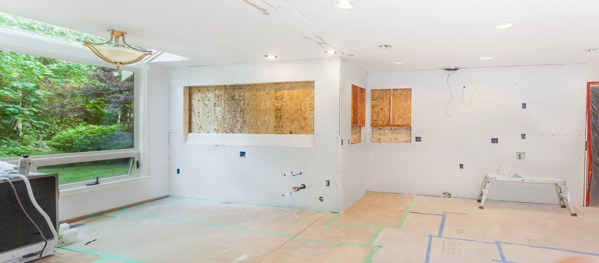 Home remodeling site in Los Angeles with interior renovation and drywall installation during modernization